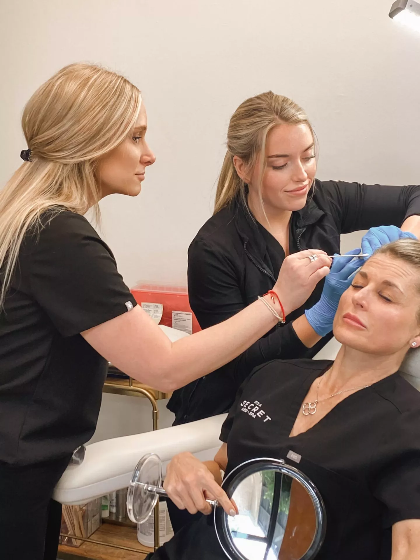 Ashley-Training-scaled At It's A Secret Med Spa, our mission is to empower people by enhancing their natural beauty through top-of-the-line injectables, lasers, and aesthetics.